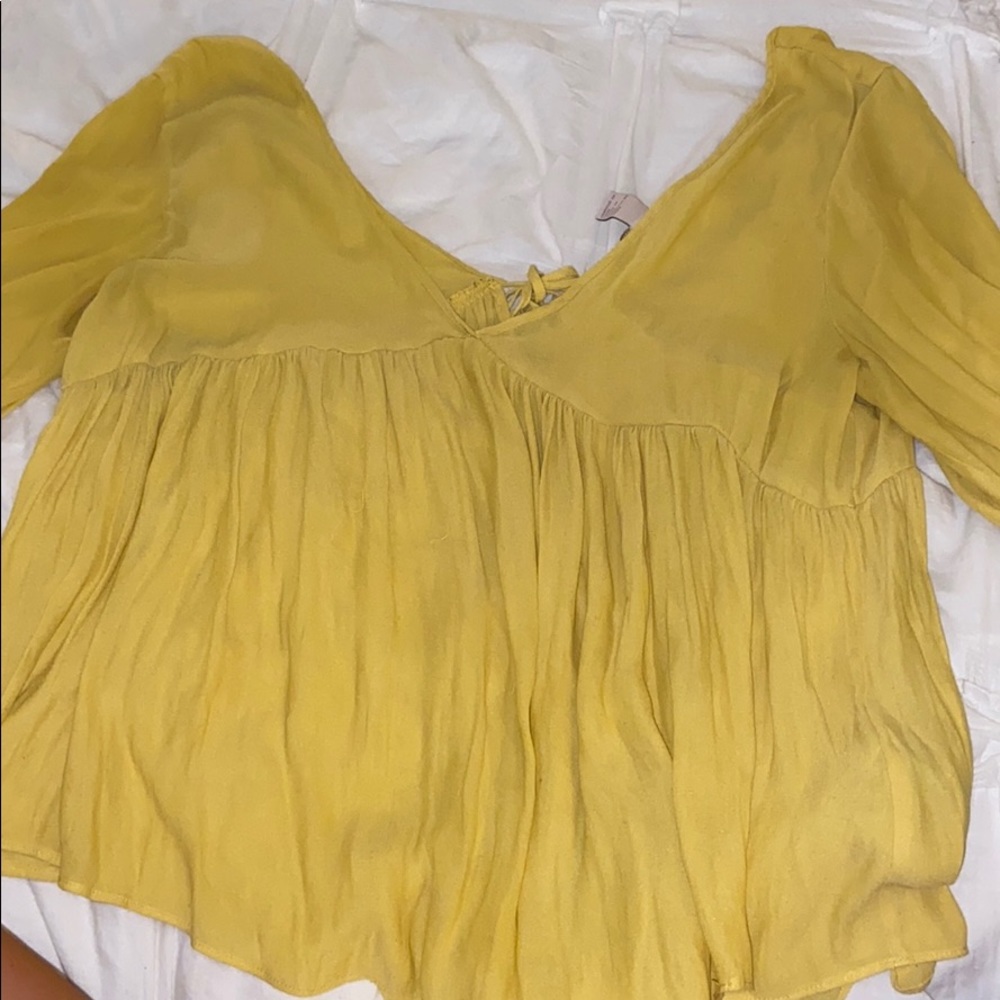 Yellow flowy top